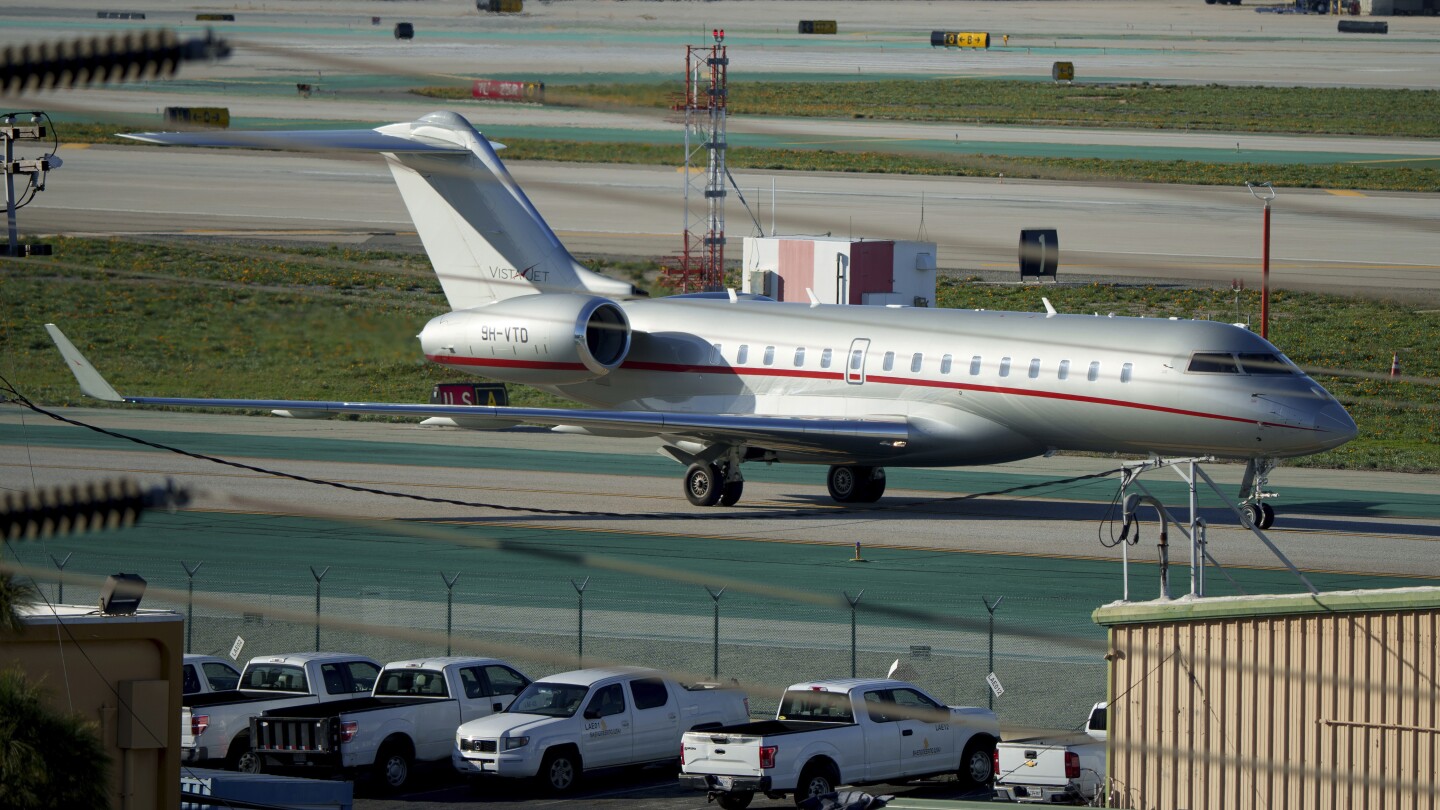 Online sleuths say Taylor Swift arrives at LAX on a flight from Tokyo to the Super Bowl