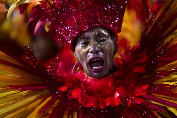 A dancer from the Grande Rio samba school performs in the Carnival parade at the Sambadrome in Rio de Janeiro, Brazil, early Monday, Feb. 12, 2024. (APPhoto/Bruna Prado)