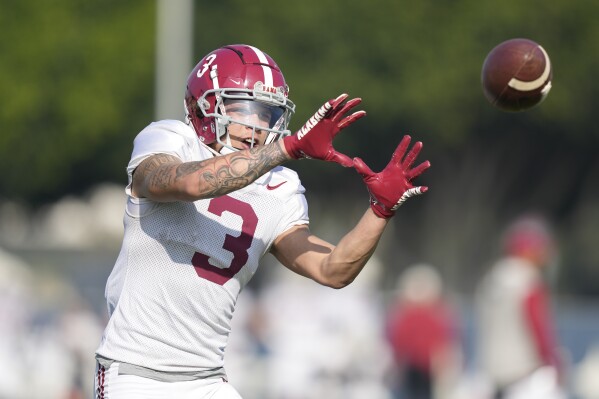 Alabama wide receiver Jermaine Burton catches a ball during practice Thursday, Dec. 28, 2023, in Carson, Calif. Alabama is scheduled to play against Michigan on New Year's Day in the Rose Bowl, a semifinal in the College Football Playoff. (AP Photo/Ryan Sun)