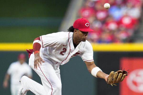 Reds power past Cubs