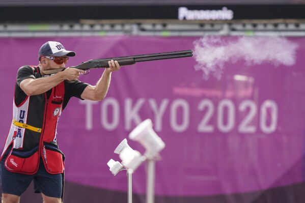 FILE - Vincent Hancock, of the United States, competes in the men's skeet at the Asaka Shooting Range in the 2020 Summer Olympics, July 26, 2021, in Tokyo, Japan. The most decorated Olympic skeet shooter of all time, Hancock has three gold medals in an event no one else has won more than once. (AP Photo/Alex Brandon, File)