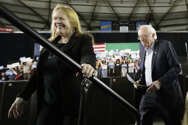 Democratic presidential candidate Sen. Bernie Sanders I-Vt., takes the stage along with his wife Jane at a campaign event in Tacoma, Wash., Monday, Feb. 17, 2020. (AP Photo/Ted S. Warren)