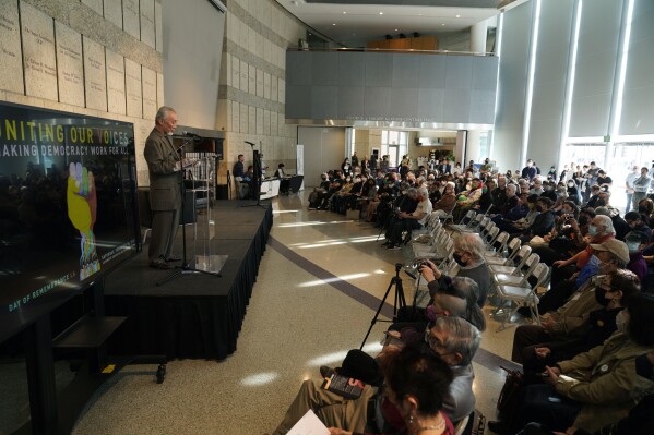 FILE - Richard Katsuda, educator and co-chair of Nikkei for Civil Rights and Redress opens the LA Day of Remembrance at the Japanese American National Museum in Los Angeles, Feb. 18, 2023. The names of thousands of people held in Japanese American incarceration camps during World War II will be digitized and made available for free, genealogy company Ancestry announced Wednesday, April 24, 2024. (AP Photo/Damian Dovarganes, File)