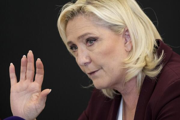 Far-right Le Pen campaigns as French 'voice of the people