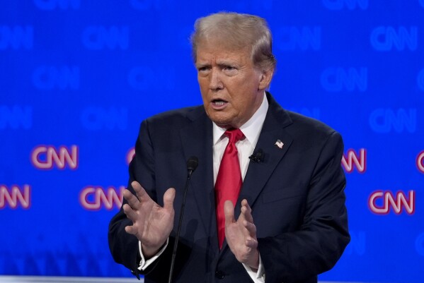 Republican presidential candidate former President Donald Trump speaks during a presidential debate with President Joe Biden, Thursday, June 27, 2024, in Atlanta. (AP Photo/Gerald Herbert)