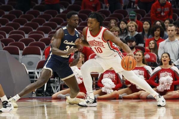 Ohio State's Brice Sensabaugh, right, posts up against Charleston Southern's Cheikh Faye during the first half of an NCAA college basketball game Thursday, Nov. 10, 2022, in Columbus, Ohio. (AP Photo/Jay LaPrete)