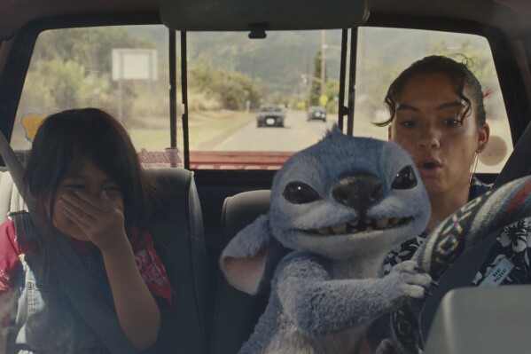 This image shows Maia Kealoha, left, and Sydney Agudong in a still from the film "Lilo & Stitch." (Walt Disney Studios Motion Pictures via AP)