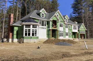 A home under construction at a development in Sudbury, Ma., on Sunday, March 12, 2023. On Thursday, Freddie Mac reports on this week's average U.S. mortgage rates. (AP Photo/Peter Morgan)