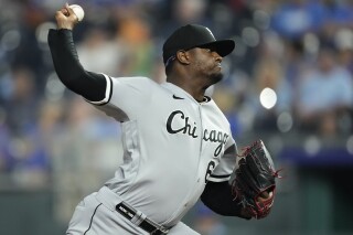 FILE - Chicago White Sox relief pitcher Gregory Santos throws during the eighth inning of a baseball game against the Kansas City Royals Wednesday, Sept. 6, 2023, in Kansas City, Mo. The Chicago White Sox traded reliever Gregory Santos to the Seattle Mariners on Saturday, Feb. 3, 2024 for two minor leaguers and a draft pick. (AP Photo/Charlie Riedel, File)
