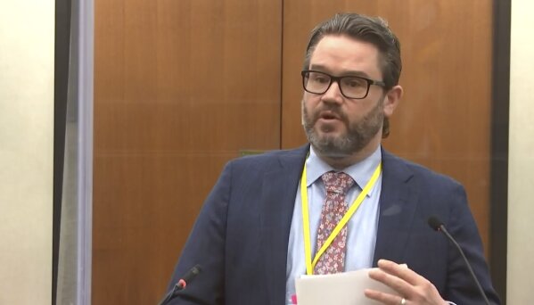 In this image taken from video, defense attorney Eric Nelson speaks as Hennepin County Judge Peter Cahill presides over jury selection, Tuesday, March 23, 2021, at the Hennepin County Courthouse in Minneapolis, in the trial of former Minneapolis police officer Derek Chauvin, who is charged in the May 25, 2020, death of George Floyd. (Court TV via AP, Pool)