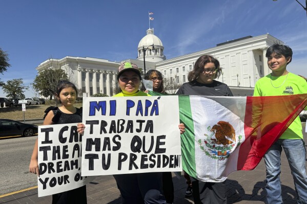 Protesters outside of Alabama's capitol opposing a slate of bills introduced by the Republican legislature that would crack down on immigration.Montgomery, Ala., March 19, 2025. (AP Photo/Safiyah Riddle)