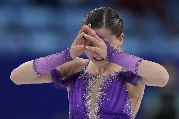Kamila Valieva, of the Russian Olympic Committee, reacts in the women's short program during the figure skating at the 2022 Winter Olympics, Tuesday, Feb. 15, 2022, in Beijing. (AP Photo/David J. Phillip)