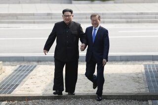 Has Korean leaders' meeting revealed Kim Jong-un's true height