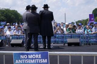 FILE - People attend the "NO FEAR: Rally in Solidarity with the Jewish People" event in Washington, Sunday, July 11, 2021, co-sponsored by the Alliance for Israel, Anti-Defamation League, American Jewish Committee, B'nai B'rith International and other organizations. A Jewish civil rights organization’s annual tally of antisemitic incidents in the U.S. reached a record high last year, with a surge that coincided with an 11-day war between Israel and the Hamas militant group, according to a report released Tuesday, April 26, 2022. (AP Photo/Susan Walsh, File)