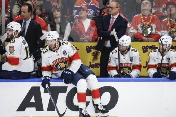 Florida Panthers coach Paul Maurice watches play against the Edmonton Oilers during the first period of Game 4 of the NHL hockey Stanley Cup Final, Saturday, June 15, 2024, in Edmonton, Alberta. (Jeff McIntosh/The Canadian Press via AP)