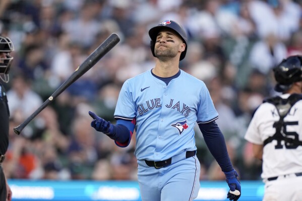 Toronto Blue Jays' Kevin Kiermaier flips his bat after striking out during the fifth inning of a baseball game against the Detroit Tigers, Thursday, May 23, 2024, in Detroit. (AP Photo/Carlos Osorio)