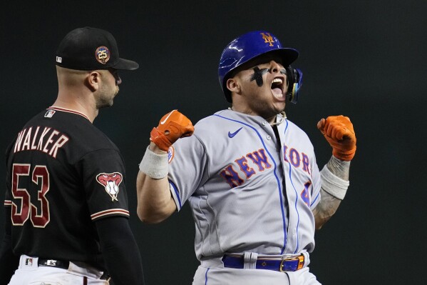 Down to last strike, the Mets rally on Alvarez's homer and Canha's triple  to beat the D-backs 2-1