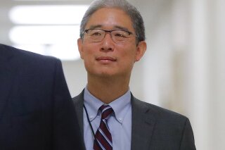 
              In this Aug. 28, 2018, file photo, Justice Department official Bruce Ohr arrives for a closed hearing of the House Judiciary and House Oversight committees on Capitol Hill in Washington. A former British spy told Ohr, a senior Justice Department lawyer, at a breakfast meeting on July 30, 2016, that Russian intelligence believed it had Donald Trump “over a barrel,” according to multiple people familiar with the encounter. (AP Photo/Pablo Martinez Monsivais)
            