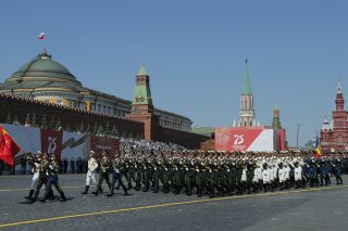 FILE - In this June 24, 2020 file photo, soldiers from China's People's Liberation Army march toward Red Square during the Victory Day military parade marking the 75th anniversary of the Nazi defeat in Red Square in Moscow, Russia. Chinese and Russian forces will take part in joint military exercises in southern Russia later in September along with troops from Armenia, Belarus, Iran, Myanmar, Pakistan and others, China's defense ministry announced Thursday, Sept. 10, 2020. (AP Photo/Alexander Zemlianichenko, File)