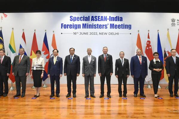 In this photo provided by Indian Foreign Minister S. Jaishankar's Twitter handle, Jaishankar, center, stands with Southeast Asian foreign ministers at the start of a meeting in New Delhi, India, Thursday, June 16, 2022. Jaishankar said India and the Association of Southeast Asian Nations face geopolitical headwinds from the war in Ukraine and its knock-on effects on food and energy security as well as fertilizer and commodities prices and logistics and supply chain disruptions. (Indian Foreign Minister S. Jaishankar's Twitter handle via AP)