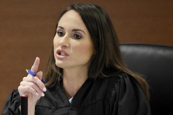 Judge Elizabeth Scherer speaks during jury selection in the penalty phase of the trial of Marjory Stoneman Douglas High School shooter Nikolas Cruz at the Broward County Courthouse in Fort Lauderdale on Monday, May 23, 2022. Cruz previously plead guilty to all 17 counts of premeditated murder and 17 counts of attempted murder in the 2018 shootings. (Amy Beth Bennett/South Florida Sun Sentinel via AP, Pool)