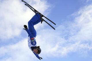 FILE - Dani Loeb practices in the World Cup women's freestyle aerials skiing event Feb. 6, 2021, in Deer Valley, Utah. Olympic hopeful Loeb says she is optimistic that police are able to recover her custom skis, helmet, jackets and other gear stolen in Atlanta now that two suspects are in custody. (AP Photo/Rick Bowmer, File)