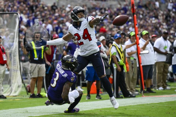 Houston Texans' Derek Stingley Jr. is called for pas interference on a pass to Baltimore Ravens' Odell Beckham Jr. during the second half of an NFL football game Sunday, Sept. 10, 2023, in Baltimore. (AP Photo/Nick Wass)