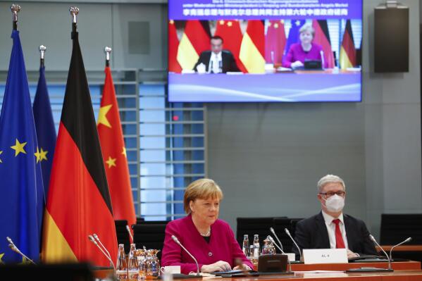 German Chancellor Angela Merkel attends virtual talks with Chinese Premier Li Keqiang as part of the Sixth German-Chinese Government Consultations, in Berlin, Germany April 28, 2021.  (Michele Tantussi/Pool via AP)
