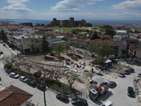 A drone photo shows a square where mass graves have been uncovered with remains believed to be dozens of prisoners slain during or after the Greek Civil War, in Thessaloniki, Greece, on Saturday, April 12, 2025. (AP Photo/Thanassis Stavrakis)