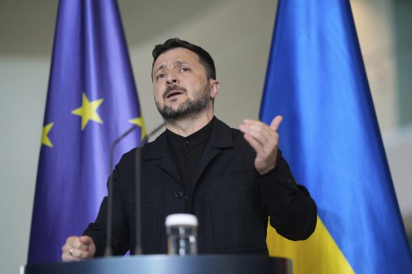 Ukraine's President Volodymyr Zelenskyy gestures during a news conference at the chancellery in Berlin, Germany, Wednesday, May 28, 2025.(AP Photo/Markus Schreiber)