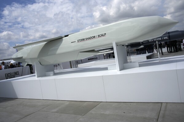 FILE - The Storm Shadow cruise missile is on display during the Paris Air Show in Le Bourget, north of Paris, France, on June 19, 2023. French President Emmanuel Macron has called for Western countries to let Ukraine strike military bases inside Russia with the sophisticated long-range weapons they are providing to Kyiv. It is the most recent sign of a potentially significant policy shift that could help change the complexion of the war. (AP Photo/Lewis Joly, File)