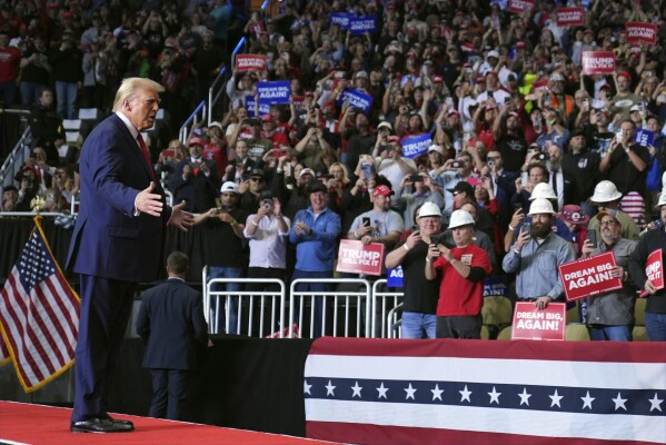 Republican presidential nominee former President Donald Trump arrives at a campaign rally at PPG Paints Arena, Monday, Nov. 4, 2024, in Pittsburgh, Pa. (AP Photo/Evan Vucci)