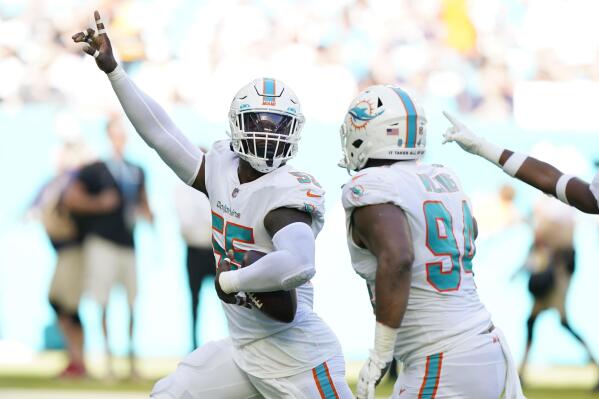 Miami Dolphins free safety Jevon Holland (8) intercepts a pass in the end  zone intended for Houston Texans wide receiver Brandin Cooks (13) during  the first half of an NFL football game