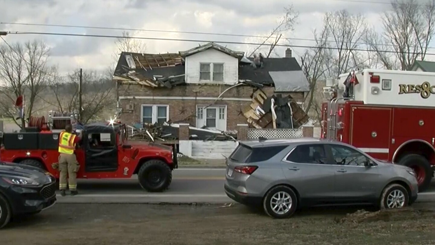 Severe storms rake Indiana and Kentucky, damaging dozens of structures