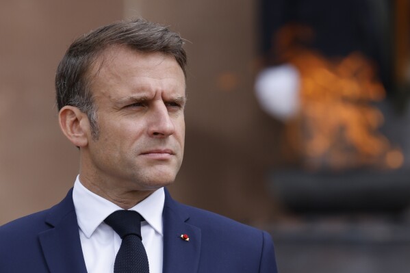 French President Emmanuel Macron attends a ceremony marking the 84th anniversary of late French General Charles de Gaulle's World War II resistance call of June 18, 1940, at the Mont-Valerien memorial in Suresnes, outside Paris, Tuesday, June 18, 2024. French President Emmanuel Macron dissolved the National Assembly, parliament's lower house, in a shock response to a humbling defeat by the far right in the European Parliament election on June 9. (Ludovic Marin, Pool via AP)
