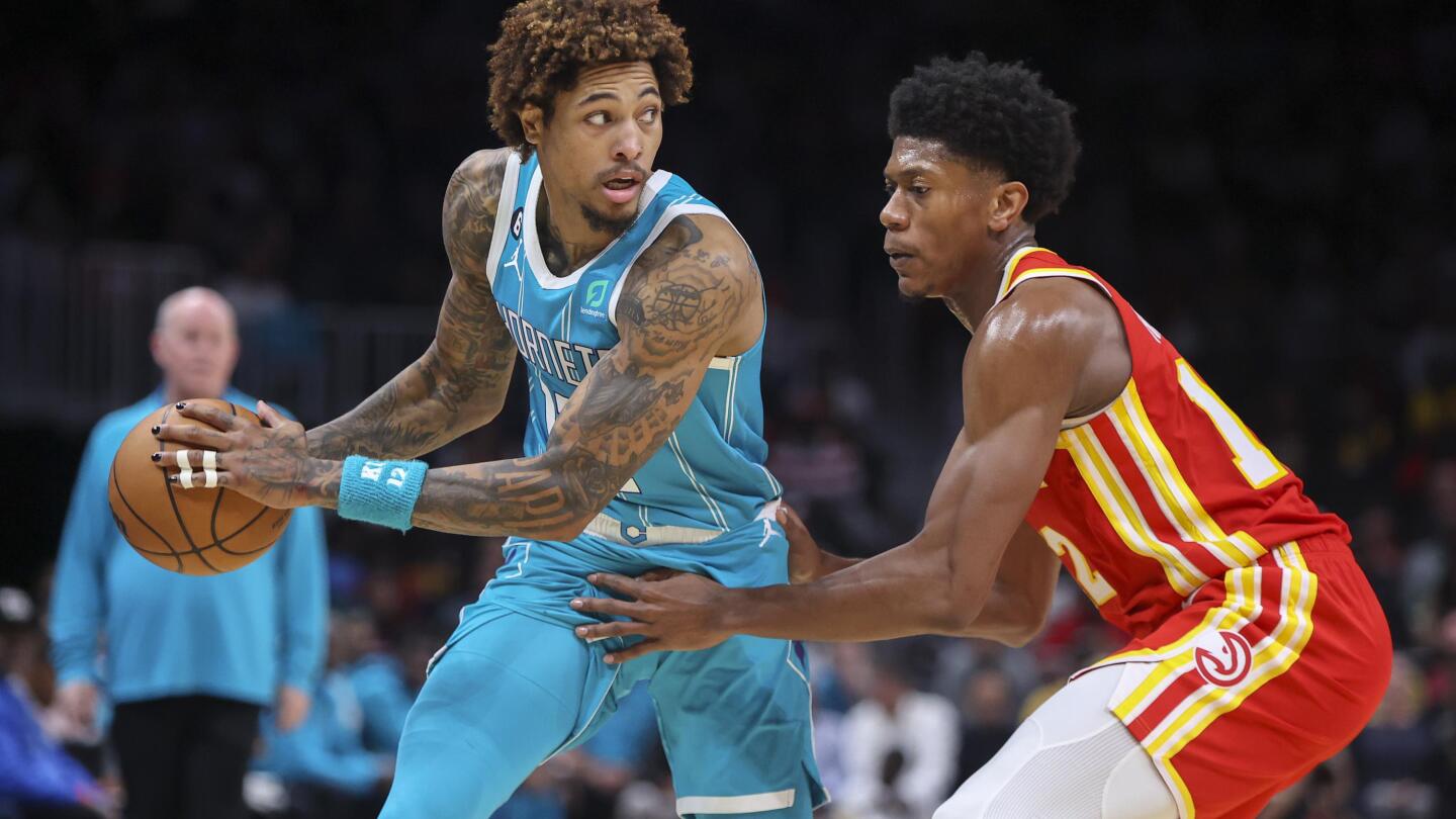 Phoenix Suns forward Kelly Oubre Jr. (3) reacts to a foul call during the  third quarter of an NBA basketball game against the Denver Nuggets, Friday,  Oct. 25, 2019, in Denver. (AP