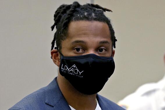 Former New England Patriots NFL football player Patrick Chung stands during his arraignment at Quincy District Court, Tuesday, Oct. 26, 2021 in Quincy, Mass.. Chung, who plead not guilty, was charged with assault and battery on a family or household member and one charge of vandalizing property during his appearance. (Matt Stone/The Boston Herald via AP)