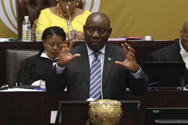 FILE — South African President Cyril Ramaphosa responds to questions in Parliament Cape Town, South Africa, Thursday, Sept. 29, 2022 where he denied allegations of money laundering while being questioned over a scandal that threatens his position and the direction of Africa's most developed economy. Ramaphosa is facing serious calls to step down after a parliamentary probe found he may have breached the country's anti-corruption laws related to the theft of millions of dollars at his Phala Phala game farm. (AP Photo/Nardus Engelbrecht/File)