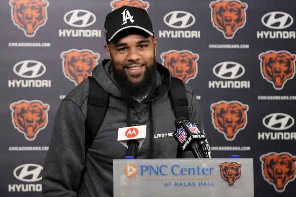 Chicago Bears wide receiver Keenan Allen smiles as he listens to reporters during a news conference following practice at the NFL football teams minicamp in Lake Forest, Ill., Tuesday, June 4, 2024. (AP Photo/Nam Y. Huh)