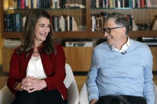FILE - In this Feb. 1, 2019, file photo, Bill and Melinda Gates smile at each other during an interview in Kirkland, Wash.  It was a healthy year for big gifts to charitable causes in 2021, a year that saw one of the largest multibillion-dollar contributions in more than a decade, according to a Chronicle tally. The power philanthropists Bill Gates and Melinda French Gates announced in May that they were divorcing and then gave a jaw-dropping $15 billion to their foundation in July. (AP Photo/Elaine Thompson, File)