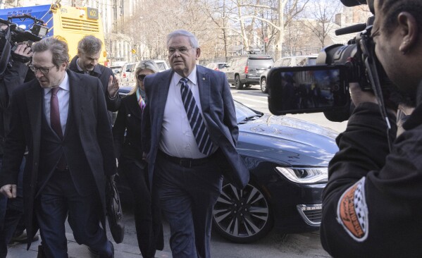 Sen. Bob Menendez, D-N.J., arrives at Manhattan federal court, Monday, March 11, 2024, in New York. Sen. Menendez and his wife, Nadine, are charged with conspiring with three businessmen to accept bribes of gold bars, cash and a luxury car in return for the senator’s help in projects pursued by the businessmen. (AP Photo/Jeenah Moon)