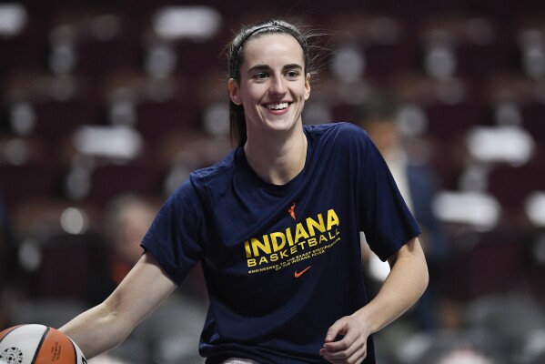 Caitlin Clark WNBA debut game results: Clark scores 20 points but Fever  fall to Sun | AP News