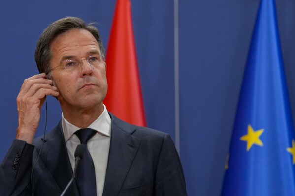 Netherland's Prime Minister Mark Rutte listens to a question during a press conference after talks with Serbia's President Aleksandar Vucic and Luxembourg Prime Minister Xavier Bettel at the Serbia Palace, in Belgrade, Serbia, Monday, July 3, 2023. Rutte and Bettel are on a one day visit to Serbia. (AP Photo/Darko Vojinovic)
