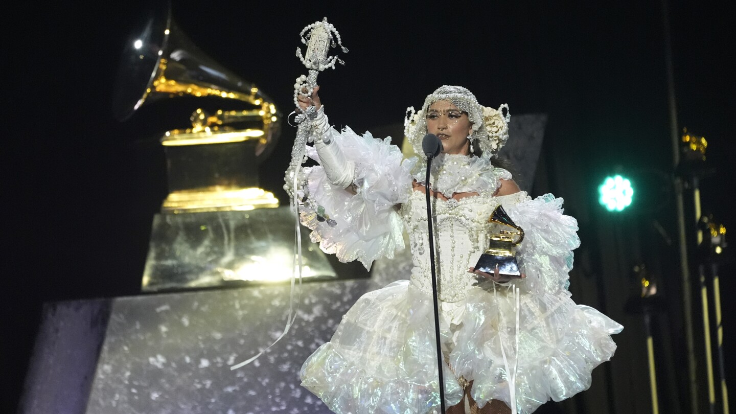 Sparkle and color pop amid more subdued tones on Grammys red carpet