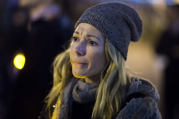 
              A woman cries during an interfaith vigil for peace in response to Manhattan Attack at Foley Square, Wednesday, Nov. 1, 2017, in New York. Multiple people were killed and others seriously injured in the Tuesday attack when, authorities say, Sayfullo Saipov, a 29-year-old from Uzbekistan, barreled along the path in a pickup truck for more than a dozen blocks. (AP Photo/Andres Kudacki)
            