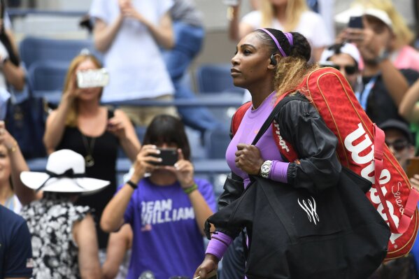 Serena Williams walks onto the court as she prepares to warm up prior to her round four match at the US Open tennis championships Sunday, Sept. 1, 2019, in New York. (AP Photo/Sarah Stier)