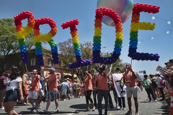 FILE - Participants take part in the annual LA Pride Parade in West Hollywood, Calif., Sunday, June 9, 2019. California Gov. Gavin Newsom signed several bills Saturday, Sept. 23, 2023, aimed at bolstering the state's protections for LGBTQ+ people, despite a controversial veto the day before that was criticized by advocates. (AP Photo/Richard Vogel, File)