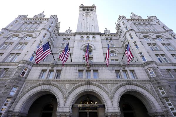 FILE - A view of the Trump International Hotel is seen on March 4, 2021, in Washington. The Trump hotel in Washington took in more than $750,000 from six foreign governments at sensitive moments in their U.S. relations, with guests spending as much as $10,000 per room a night, according to documents from the Trump family company's former accountants released Monday, Nov. 14, 2022, by a congressional committee. The Trump hotel, now a Waldorf Astoria, drew criticism from the start of Trump's presidency for taking money from GOP politicians, companies and foreign governments. (AP Photo/Julio Cortez, file)