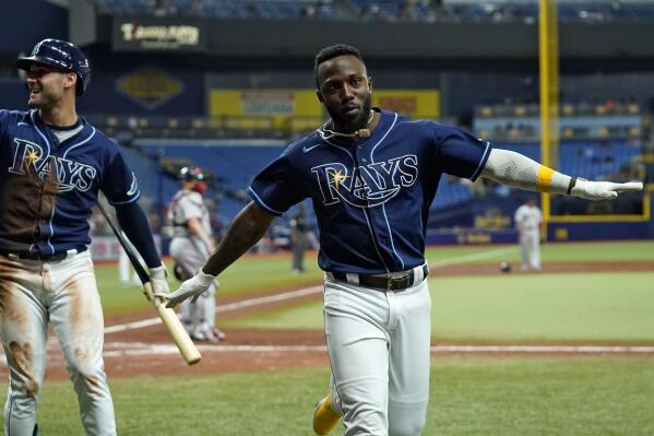 Tampa Bay Rays' Randy Arozarena celebrates after scoring on an RBI double by Yandy Diaz off Boston Red Sox pitcher Stephen Gonsalves during the third inning of a baseball game Tuesday, Aug. 31, 2021, in St. Petersburg, Fla. (AP Photo/Chris O'Meara)