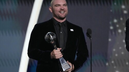 Professional MLB baseball player Liam Hendriks, of the Chicago White Sox, accepts the Jimmy V award for perseverance at the ESPY awards on Wednesday, July 12, 2023, at the Dolby Theatre in Los Angeles. (AP Photo/Mark J. Terrill)